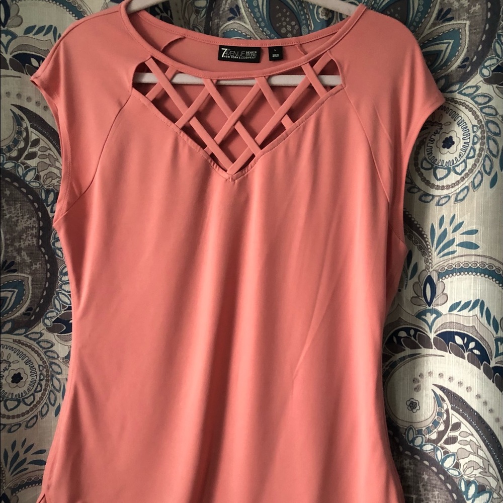 Peachy pink top.